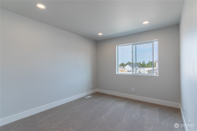 empty room featuring carpet