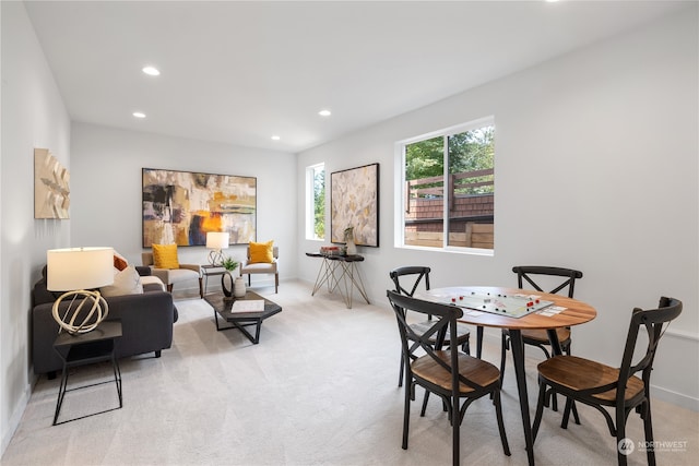 view of carpeted dining space