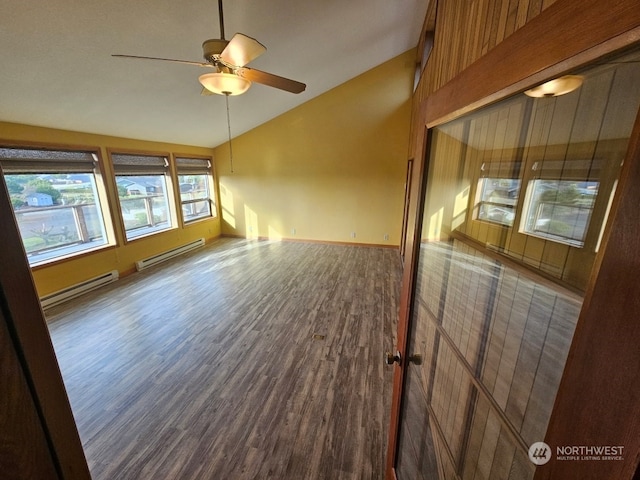 unfurnished living room with ceiling fan, high vaulted ceiling, wood-type flooring, and a baseboard heating unit