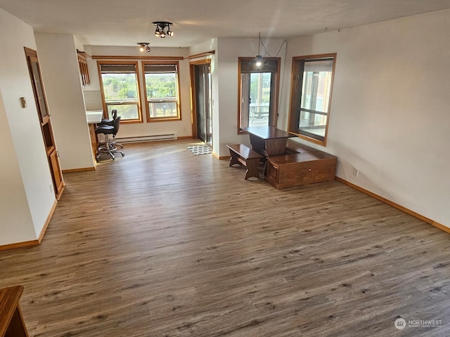 interior space with dark hardwood / wood-style floors and a baseboard radiator