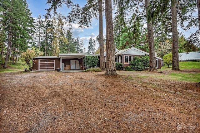 view of front of house featuring a carport