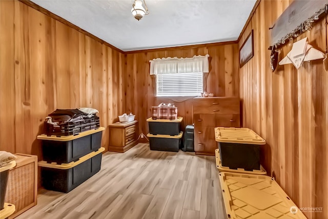 view of sauna featuring hardwood / wood-style flooring and wood walls