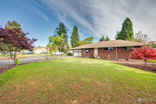 view of yard with a garage