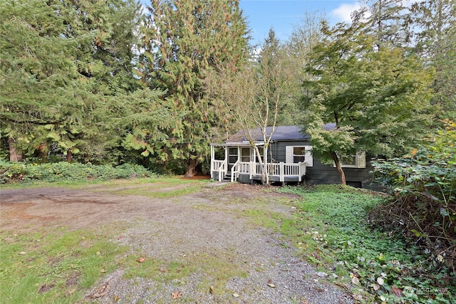 view of front of home featuring a wooden deck