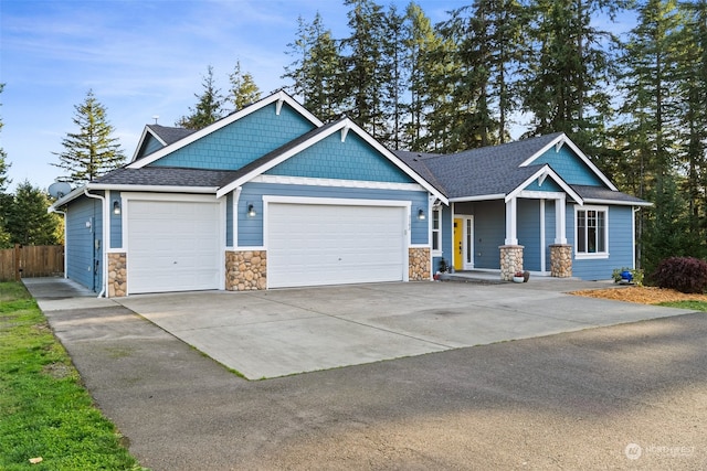 craftsman-style house featuring a garage