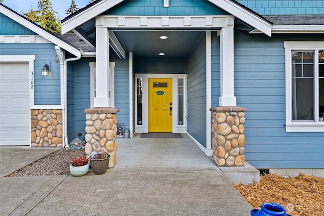 property entrance with a garage