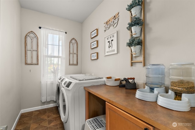 laundry room with washing machine and dryer