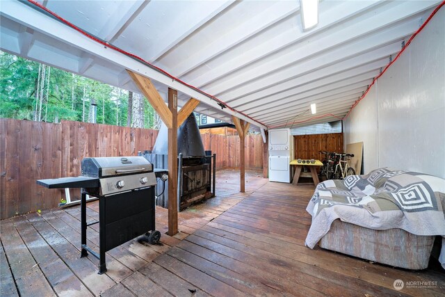137 Mountain View Dr N, Ashford, WA 98304 - wooden terrace with washer / dryer, area for grilling, and a fenced backyard