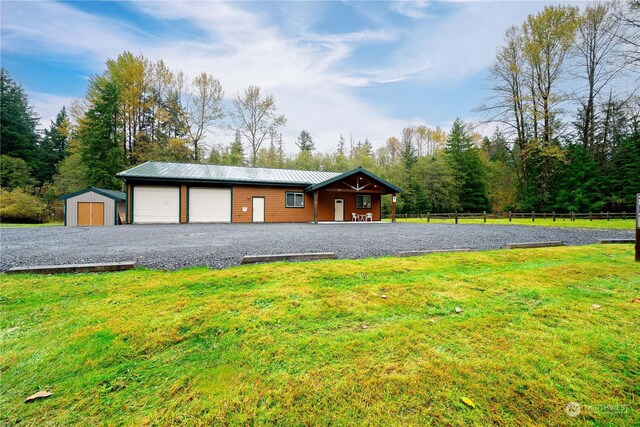 137 Mountain View Dr N, Ashford, WA 98304 - exterior space with fence and a storage unit
