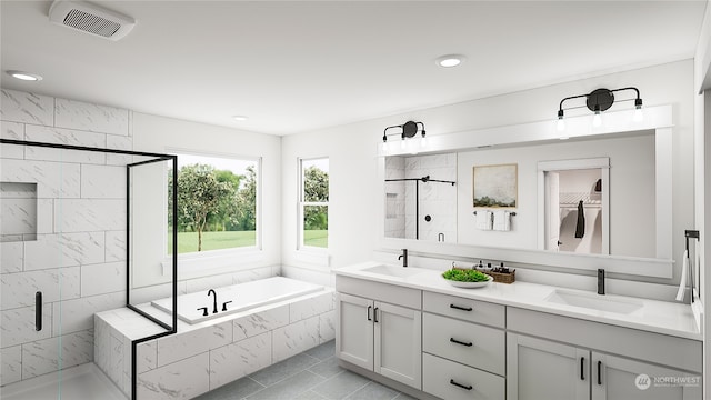 bathroom with vanity, shower with separate bathtub, and tile patterned flooring