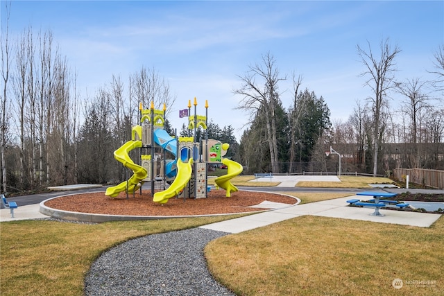 view of jungle gym with a lawn