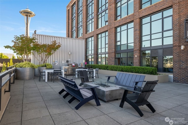 view of patio featuring an outdoor fire pit