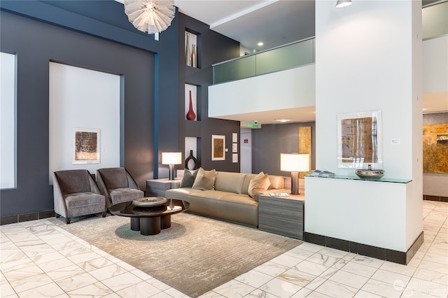 living room with a towering ceiling