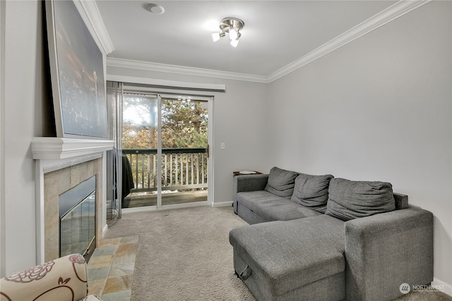 living room featuring crown molding, a tiled fireplace, and light colored carpet