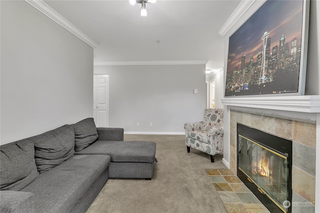 living room featuring crown molding, carpet flooring, and a fireplace