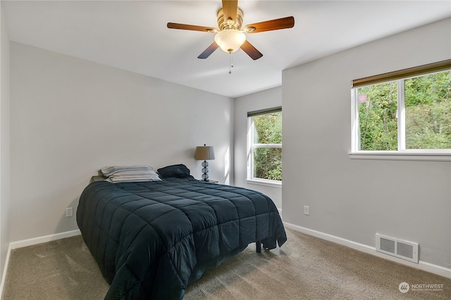 bedroom featuring carpet and ceiling fan