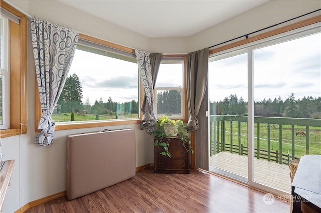 sunroom / solarium with plenty of natural light