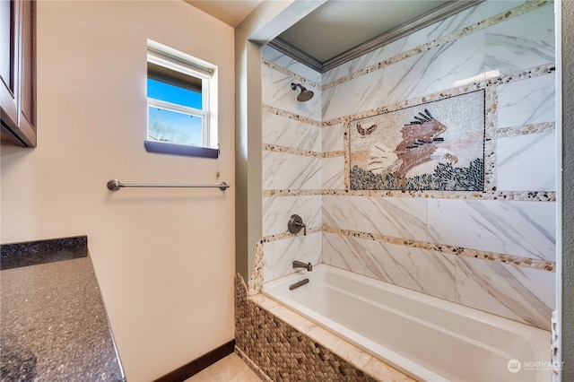 bathroom featuring tiled shower / bath