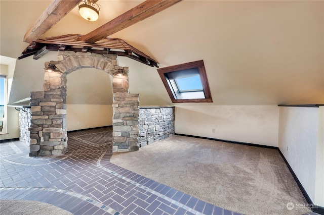 212 Grandview Ave, Camano Island, WA 98282 - bonus room featuring baseboards, carpet, lofted ceiling with beams, and ornate columns