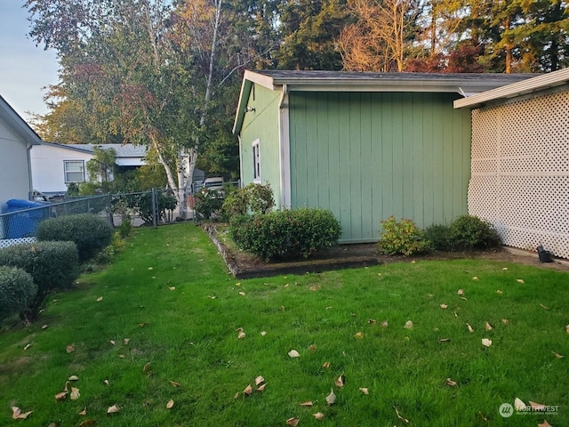 view of property exterior featuring a yard