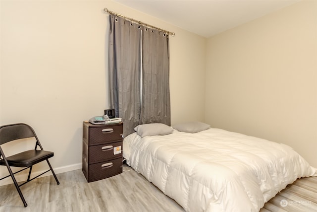 bedroom featuring light hardwood / wood-style flooring