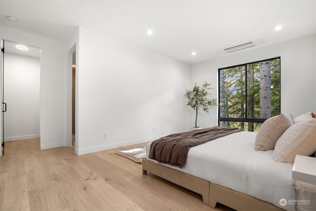 bedroom featuring light hardwood / wood-style flooring