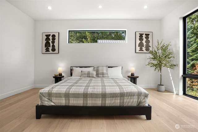 bedroom with light wood-type flooring