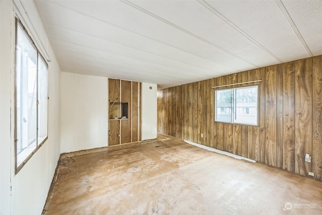 empty room with wood walls