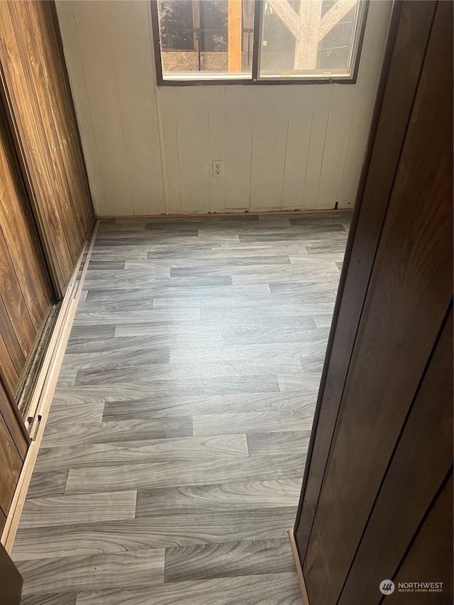 unfurnished room featuring light hardwood / wood-style flooring