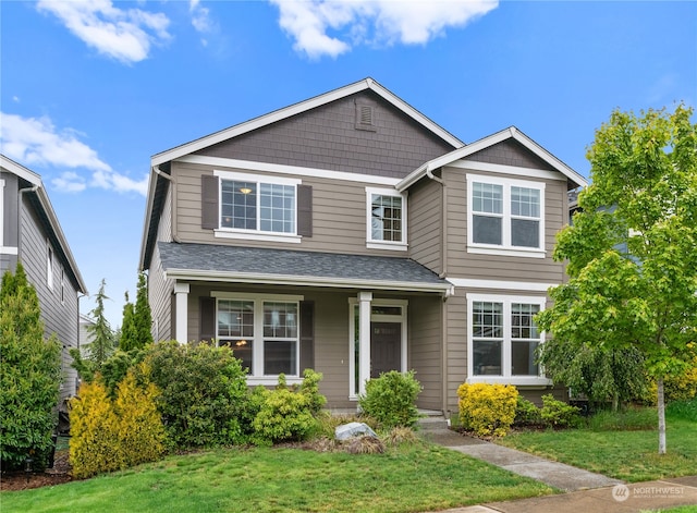 view of front of property featuring a front yard