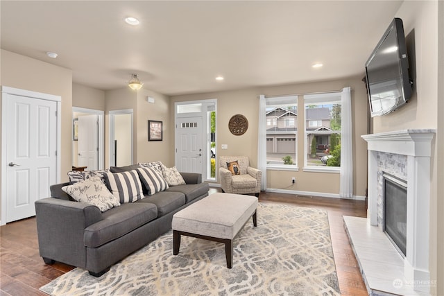 living room featuring dark hardwood / wood-style floors