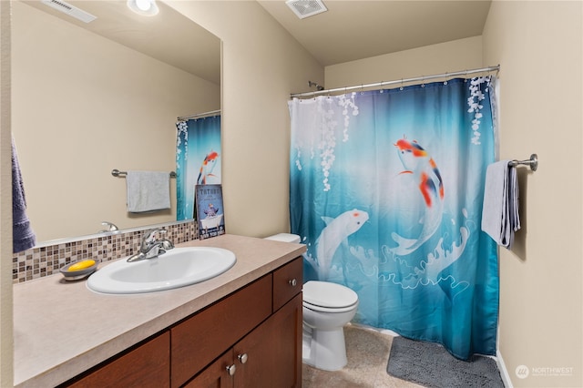 bathroom with vanity, toilet, tasteful backsplash, and a shower with shower curtain