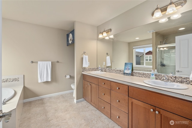 full bathroom featuring backsplash, vanity, shower with separate bathtub, and toilet