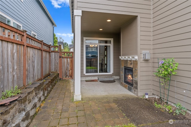 property entrance featuring a patio