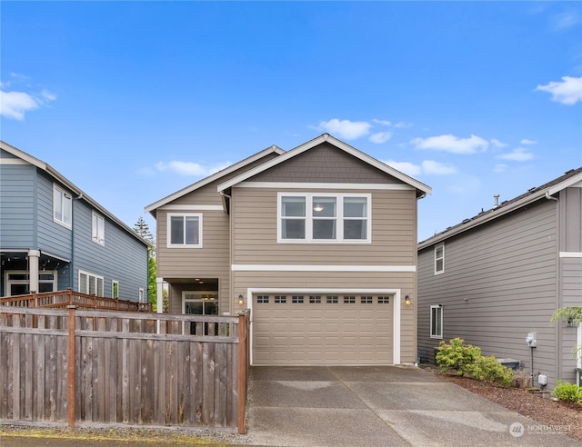 front of property with a garage