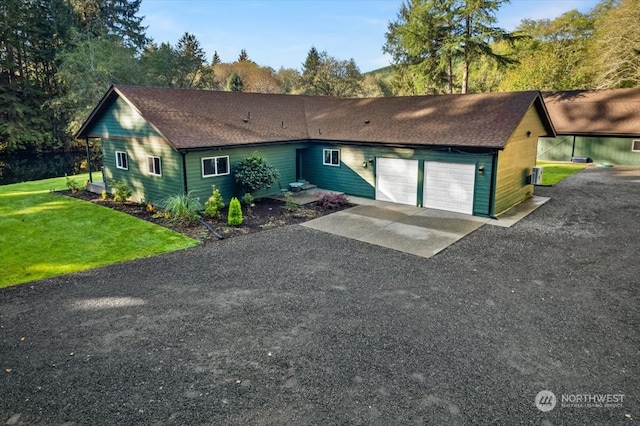 ranch-style house with a front lawn