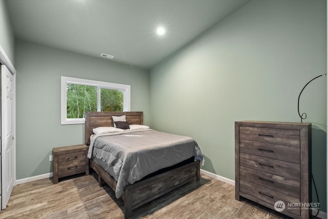 bedroom featuring light wood-type flooring