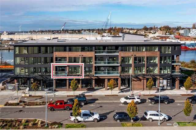 view of building exterior featuring a water view