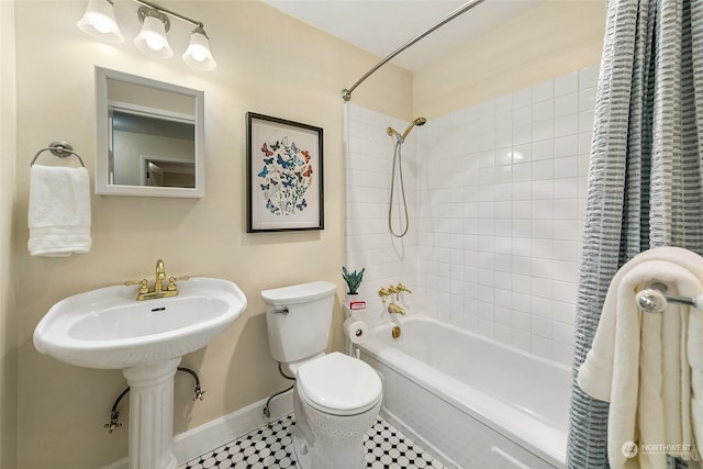 bathroom featuring toilet, tile patterned floors, and shower / bathtub combination with curtain