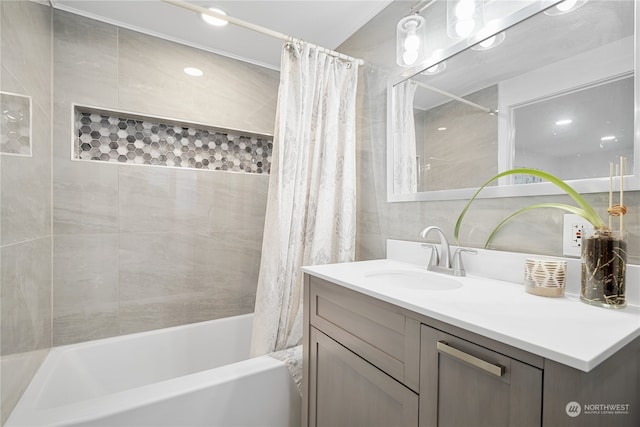 bathroom with vanity and shower / tub combo