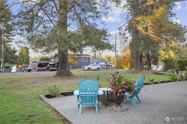 view of yard featuring a carport