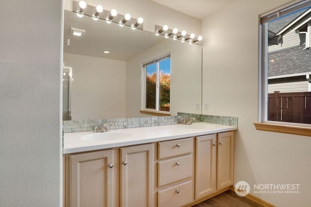 bathroom featuring vanity and hardwood / wood-style flooring