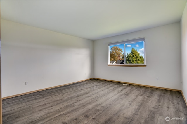13703 68th Avenue Ct E, Puyallup, WA 98373 - unfurnished room featuring wood finished floors and baseboards