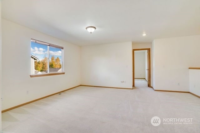 13703 68th Avenue Ct E, Puyallup, WA 98373 - empty room featuring baseboards, light colored carpet, and recessed lighting