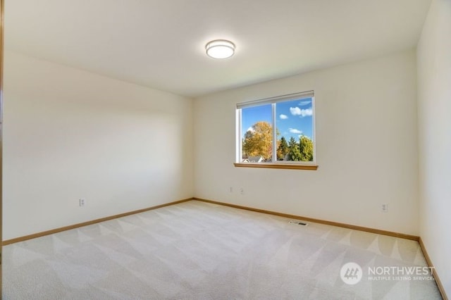 13703 68th Avenue Ct E, Puyallup, WA 98373 - unfurnished room with light carpet and baseboards