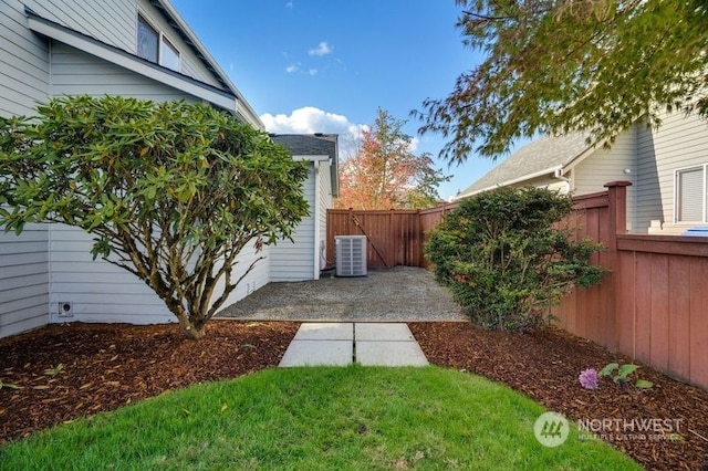 view of yard with a patio and cooling unit