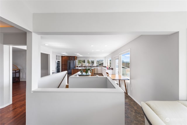 living room with dark hardwood / wood-style floors