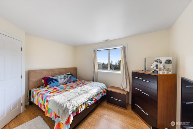 bedroom featuring light hardwood / wood-style floors