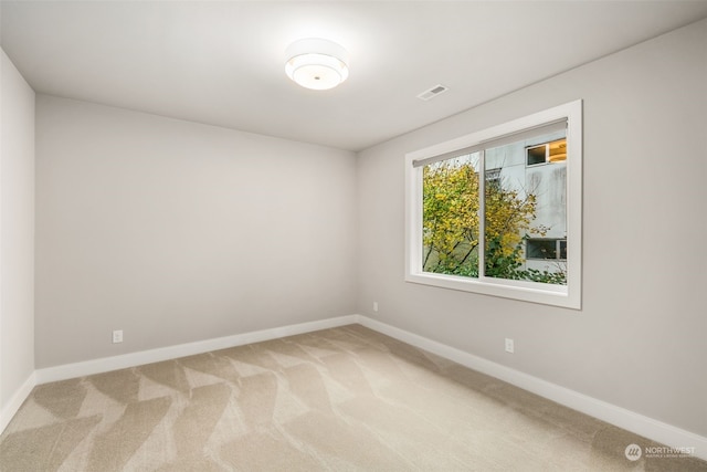 view of carpeted spare room