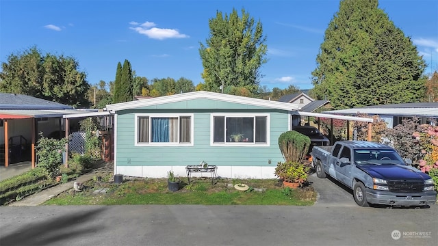 view of front of property with a carport